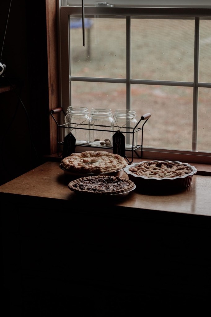 moody images of home made pies in a farmhouse kitchen 